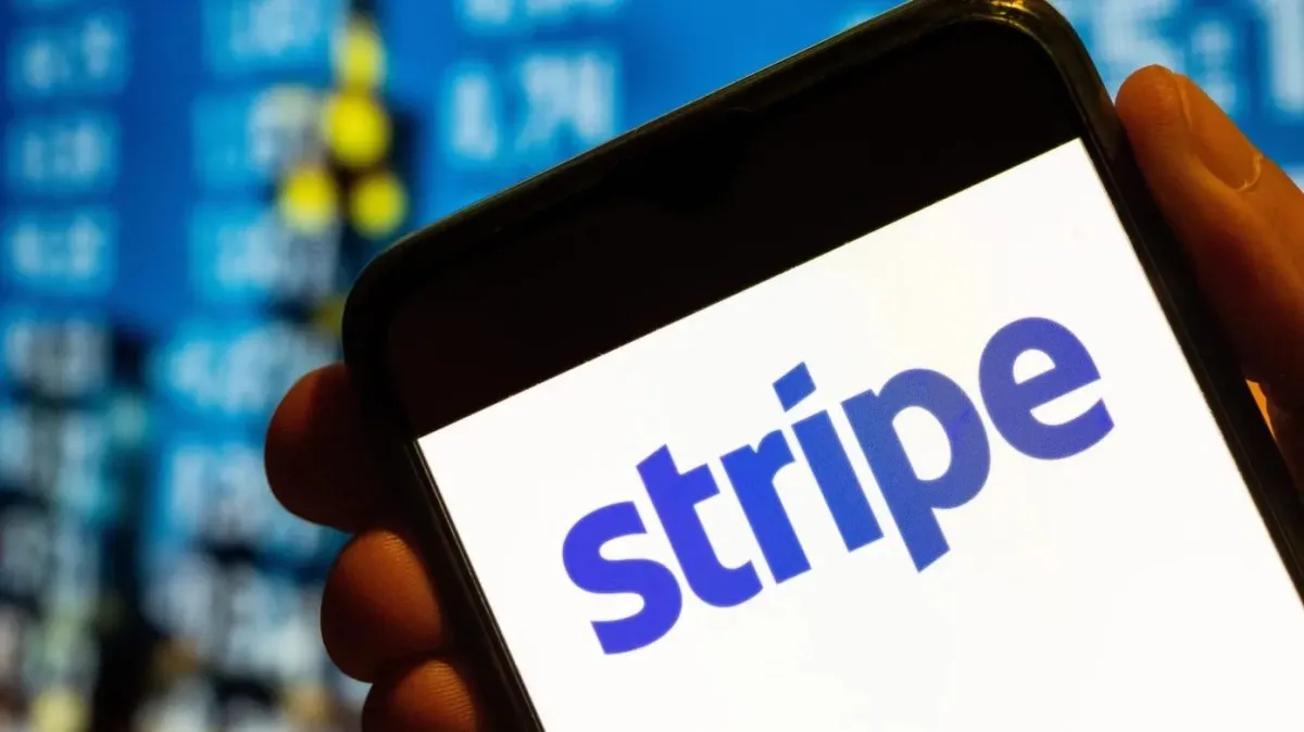The Stripe and OpenRouter logos side by side on a neutral background
